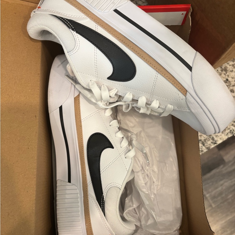 Nike White Sneakers with Black Swoosh and Tan Trim